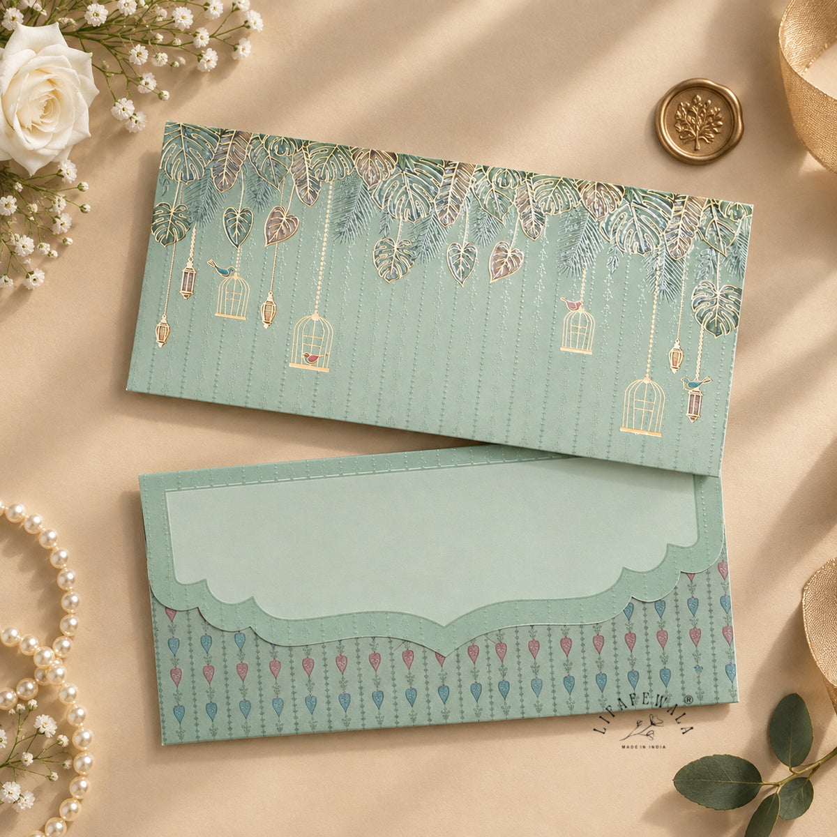 Sage Green Birdcage & Lantern matte shagun envelope by LIFAFEWALA – styled flat lay