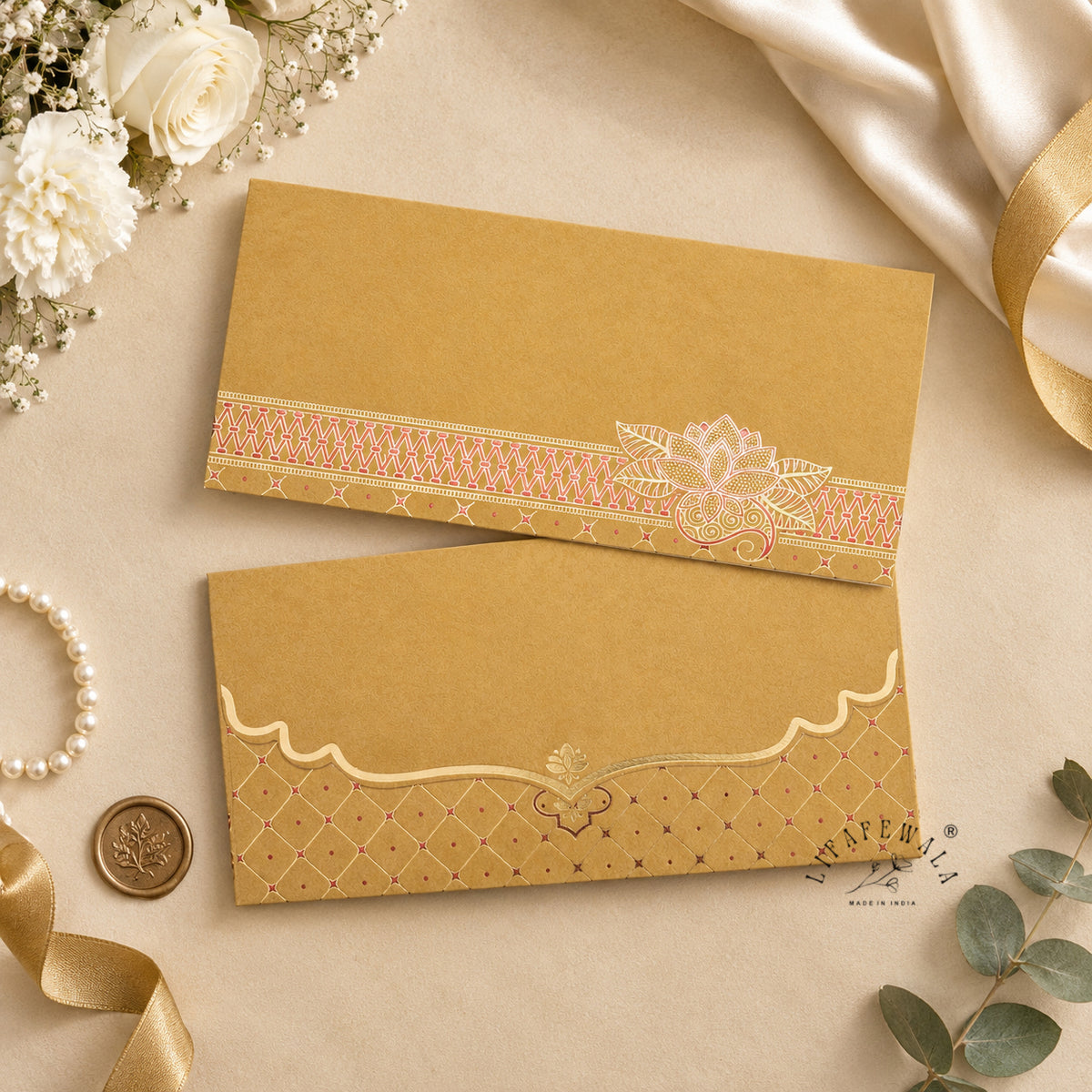 Golden Kamal Lotus velvet shagun envelope by LIFAFEWALA – styled flat lay
