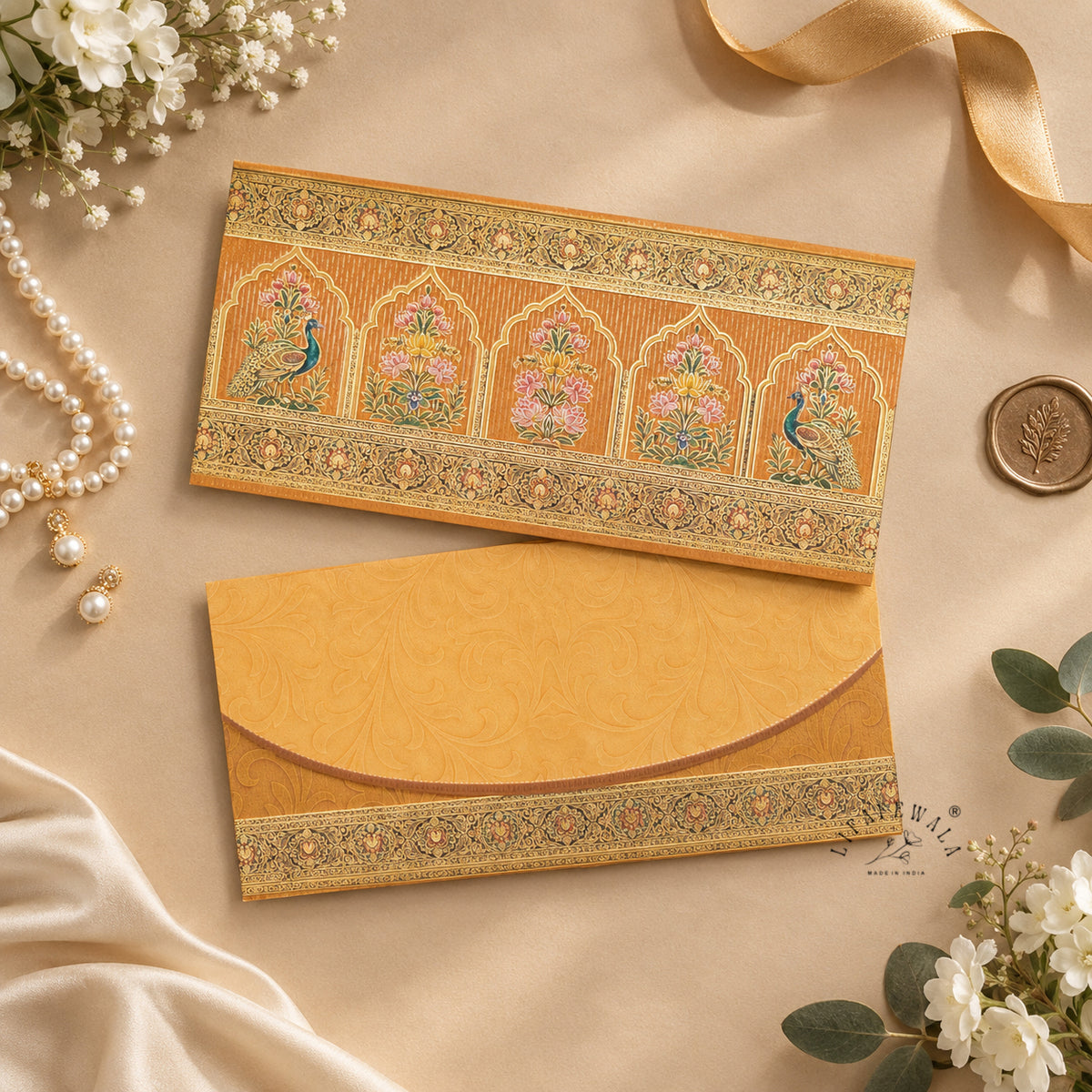 Mughal Arch Peacock & Lotus matte UV shagun envelope by LIFAFEWALA – styled flat lay