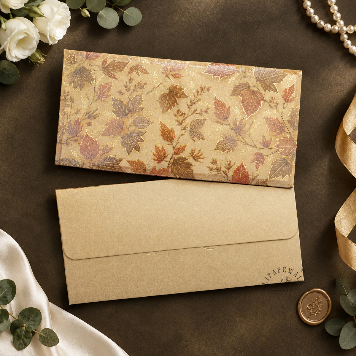 Golden Autumn Leaves scented metallic shagun envelope by LIFAFEWALA – styled flat lay