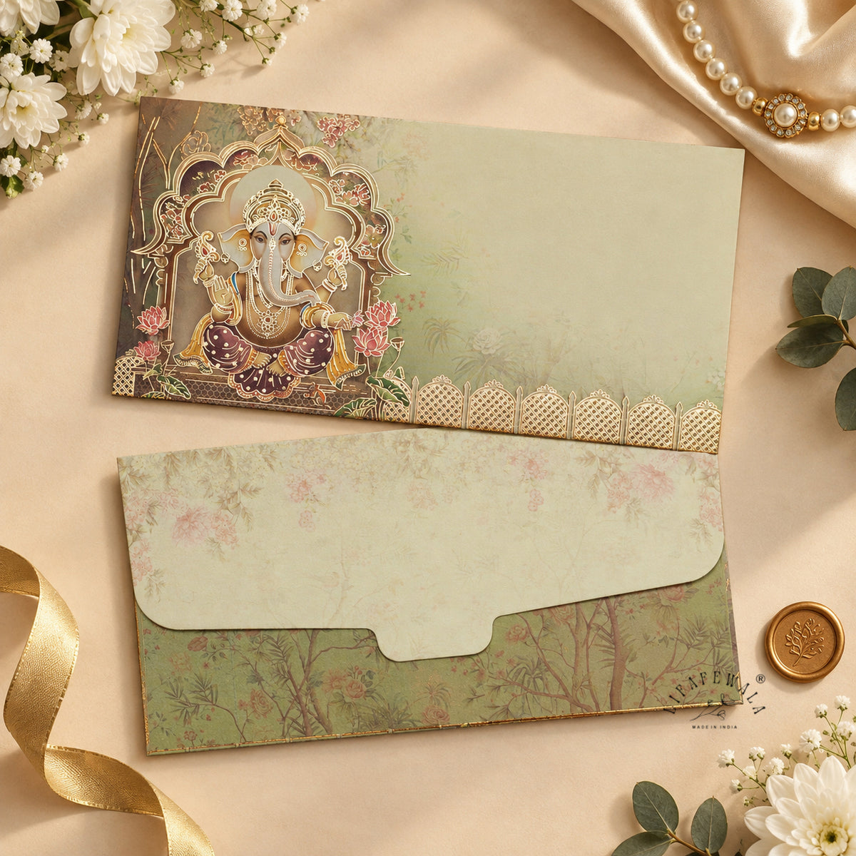 Sage Ganesha Jharokha matte shagun envelope by LIFAFEWALA – styled flat lay