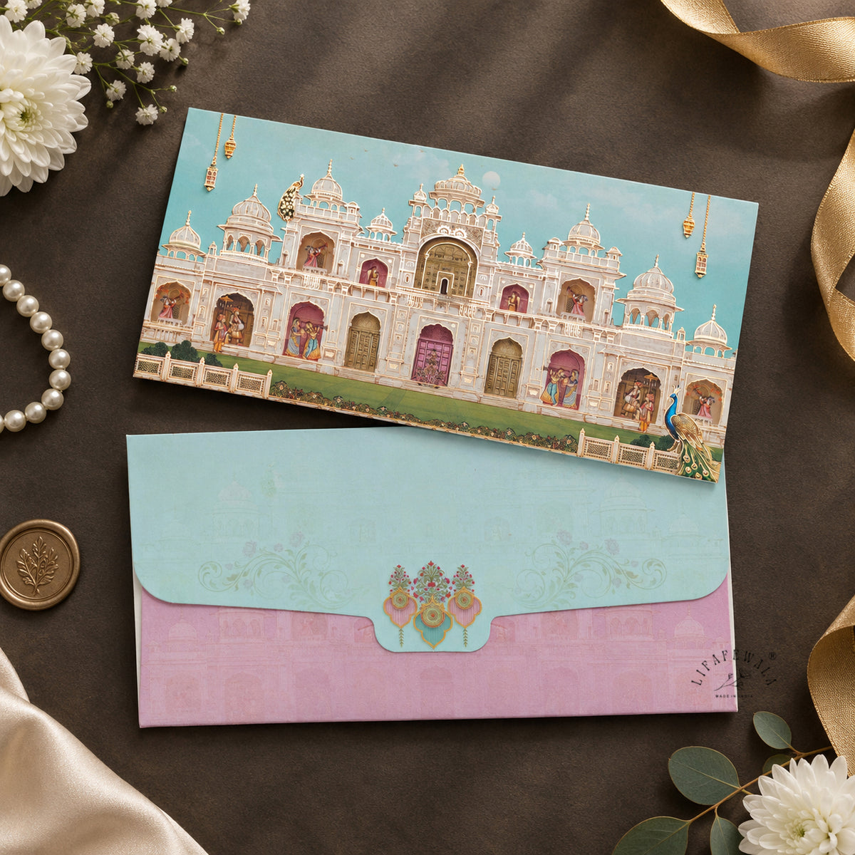 Aqua Lilac Palace Façade matte shagun envelope by LIFAFEWALA – styled flat lay