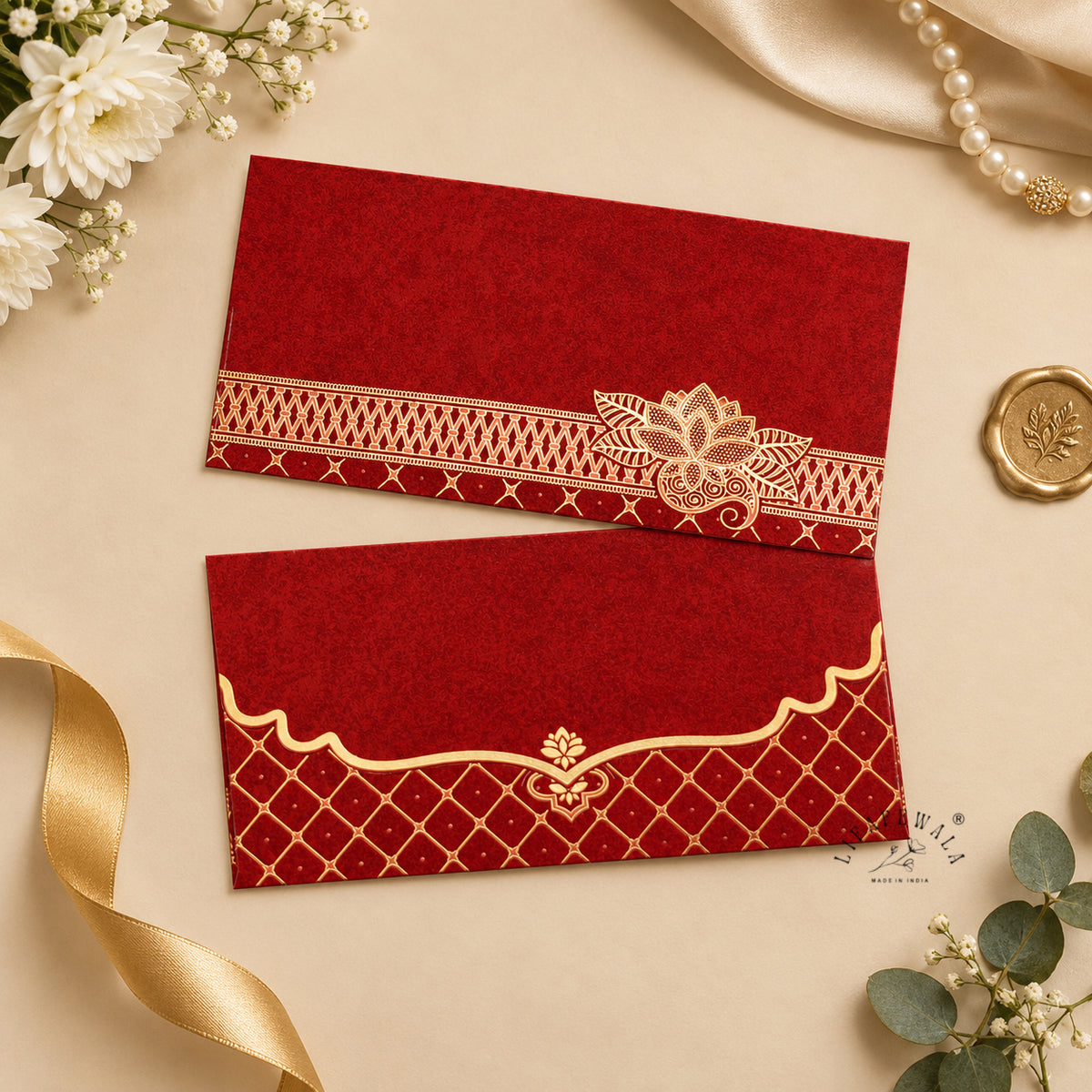 Red Kamal Lotus velvet shagun envelope by LIFAFEWALA – styled flat lay
