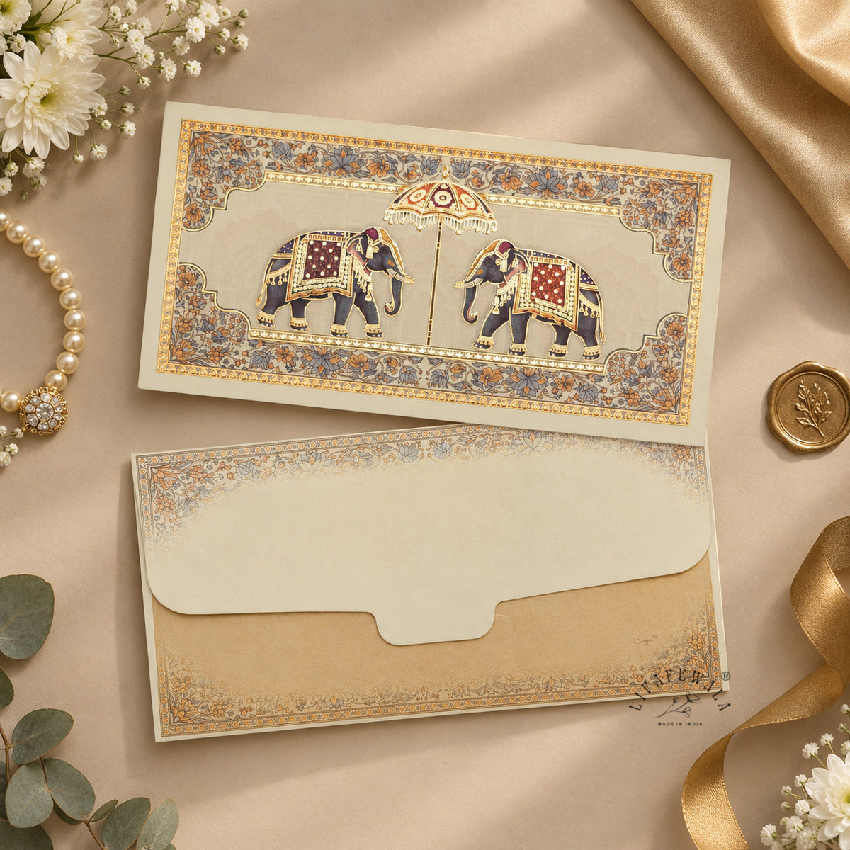 Twin Royal Elephant Chhatri matte shagun envelope by LIFAFEWALA – styled flat lay