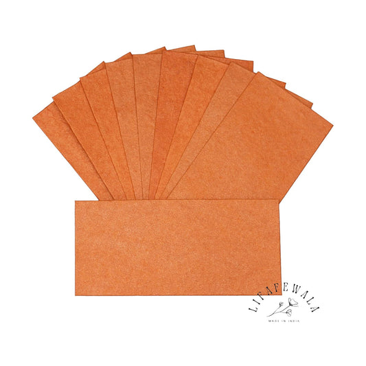 Eco-friendly orange handmade shagun envelopes.
